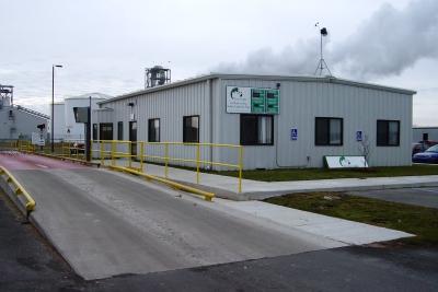 administration building with scales in front